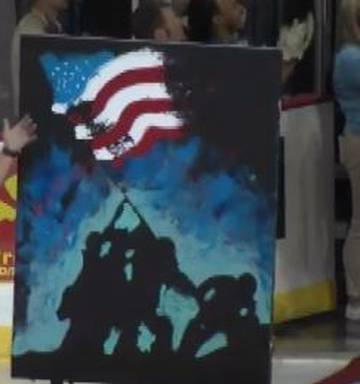 Watch Man Paints Unbelievable Picture While Singing National