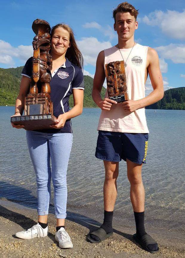 Emily Spear and David Boles defended their 2km Hinemoa Swim titles at the Ecomist Blue Lake Multisport Festival. Photo / Supplied