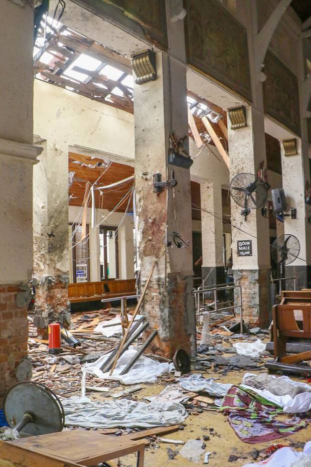 An inside view of the St. Anthony's Shrine after an explosion. A string of blasts ripped through high-end hotels and churches as worshippers attended Easter services. Photo / Getty