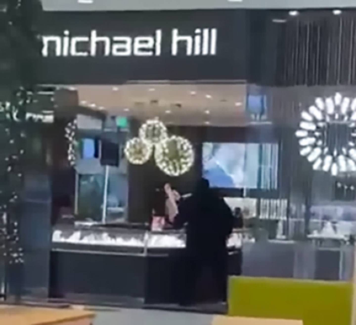 A person was caught on film stealing from a West Auckland Michael Hill Jewellers store last week. Photo / Supplied