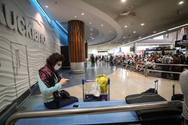 A masked passenger at the arrival gates at Auckland International Airport. Photo / File
