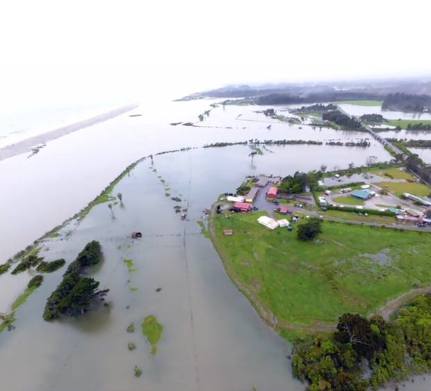 Floods on the Okuru River on the west coast. Photo / Kerry Eggeling