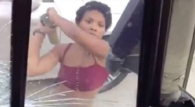 The woman then threw the item back into her trunk before trying to get away in her Audi. Photo / Twitter 