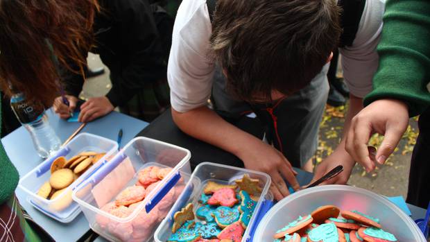 Whanganui High School students write out kind messages in exchange for a cookie as part of anti-bullying week. Photo / Caitlin Currie 