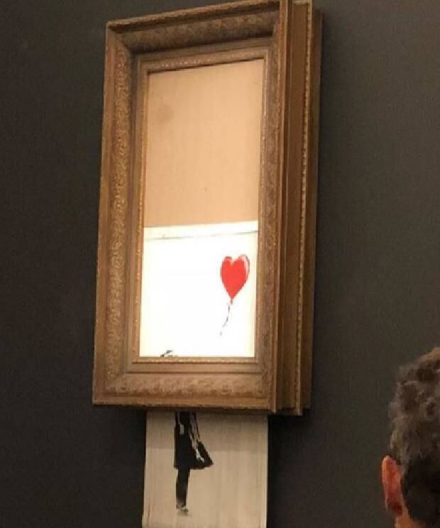 Going Going Gone Banksy Art Self Destructs After Selling For