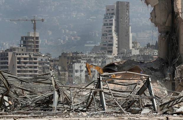 Rescuers search for missing victims at the scene of Tuesday's explosion that hit the seaport of Beirut, Lebanon. Photo / AP