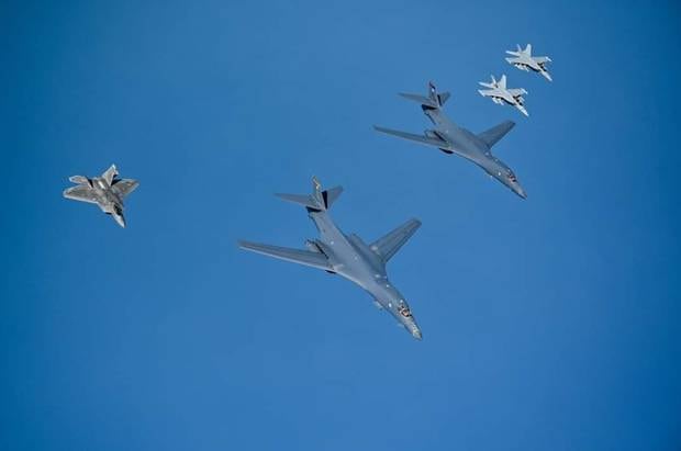 US Air Force B1-B Lancers are escorted by fighter jets. Photo / via Twitter