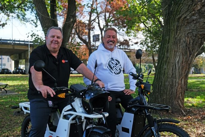 Genesis chief executive Malcolm Johns and comedian Mike King.