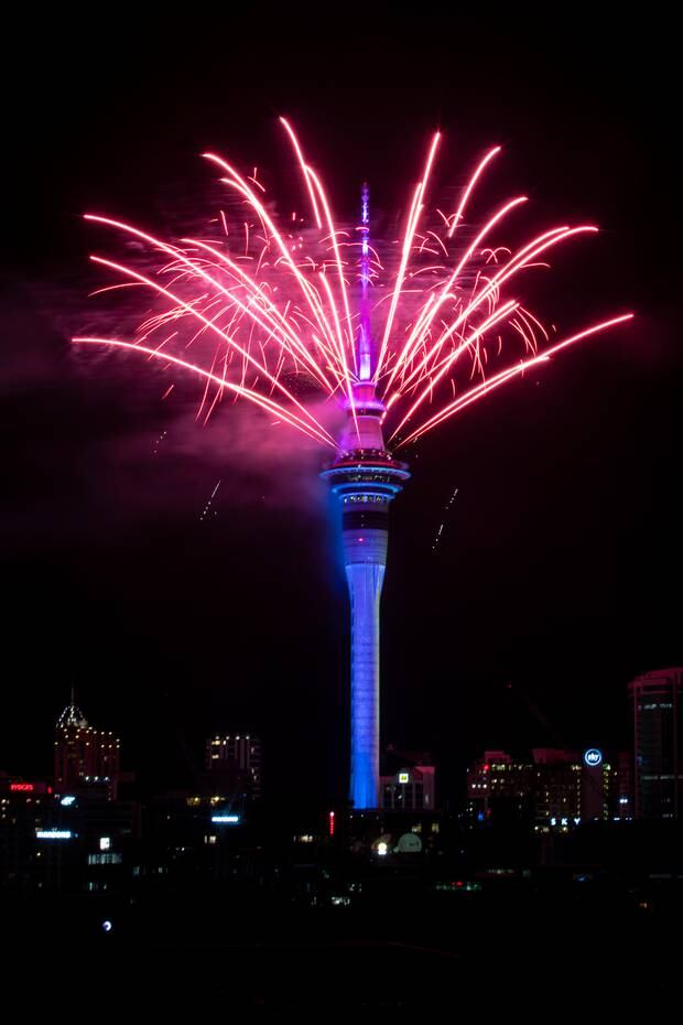 Fireworks explode off the Auckland Sky Tower for the 2020 New Year celebrations. Photo / Jason Oxenham 