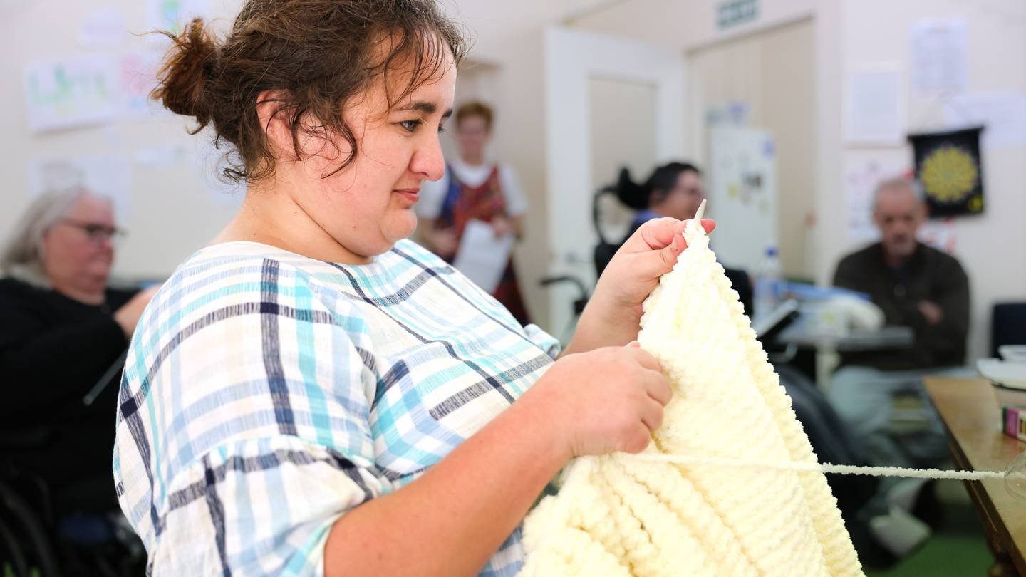 Agape Fellowship member Sophie Cochrane knits a blanket for her new nephew. Photo / Sonya Holm