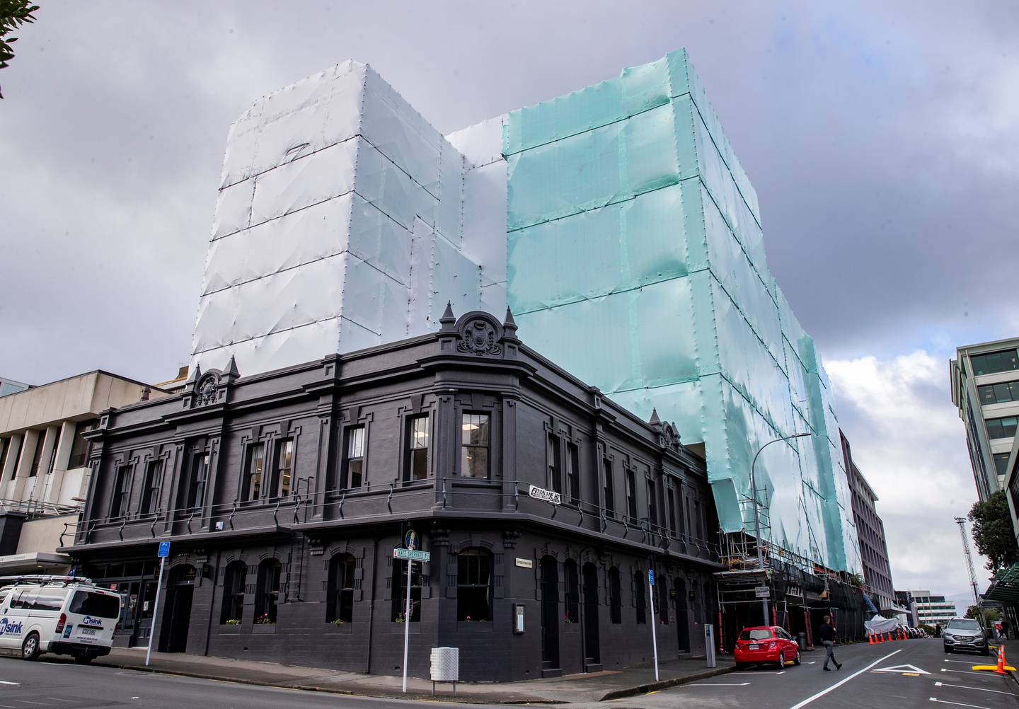 Kate Sheppard apartments in Wellington with protective wrapping while undergoing earthquake repairs last year. Photo / Mark Mitchell, File