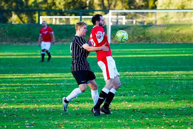 James Satherley brings down the ball under the challenge of Ethan Ladd. Photo/ Lewis Gardner 