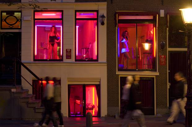 Image result for girls in bay windows in amsterdam's red light district