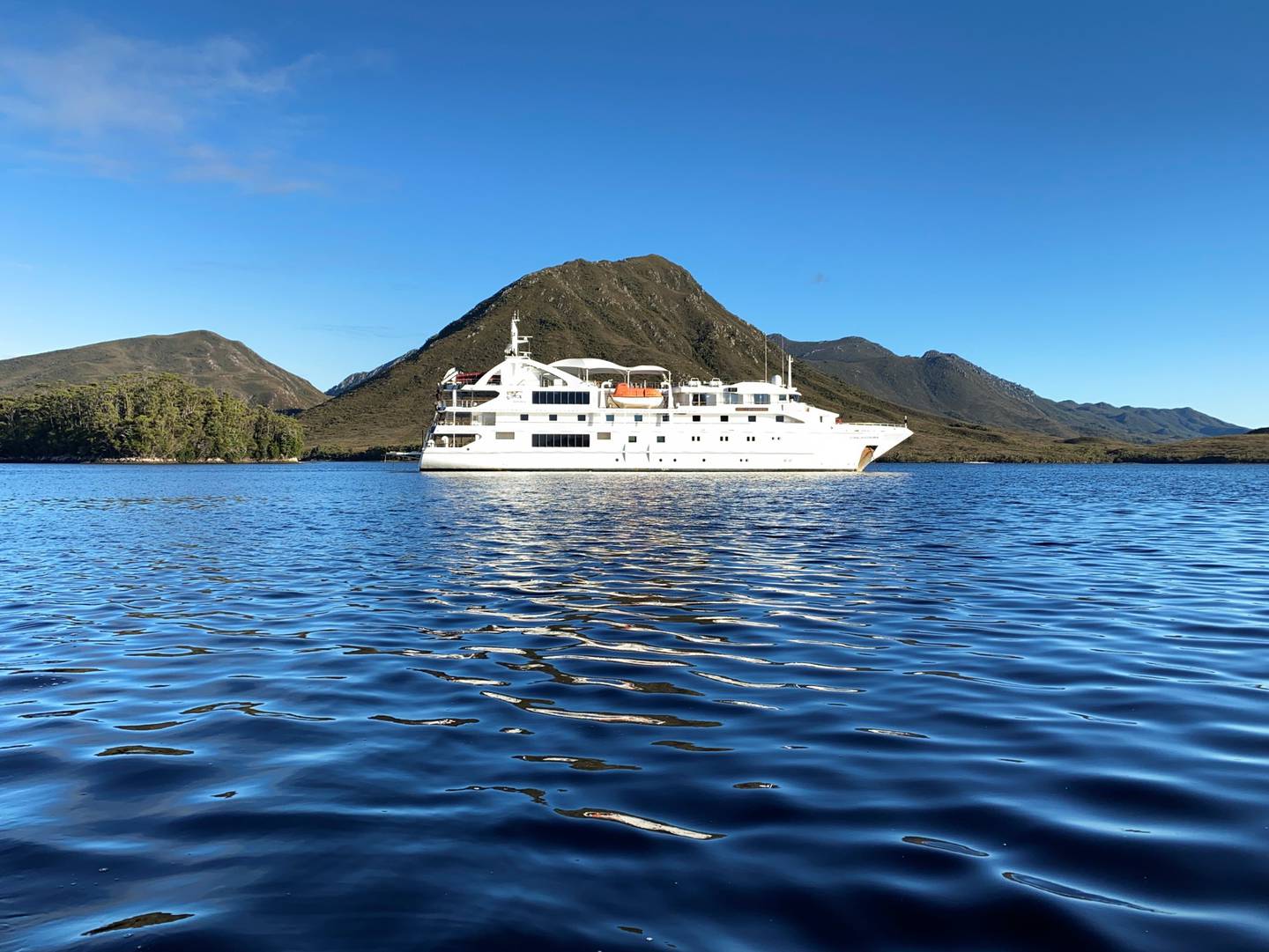 Coral Discoverer moored at Port Davey. Photo / Tiana Templeman, Supplied