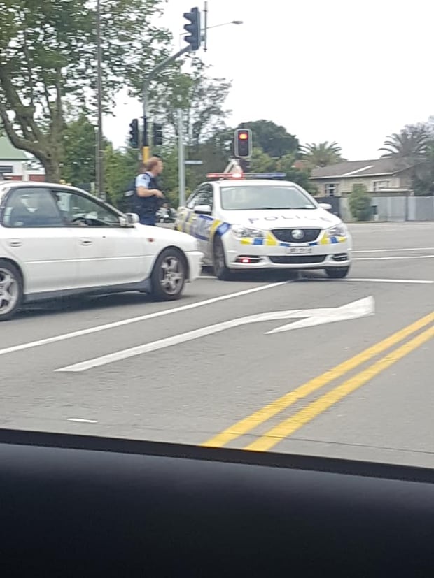 Armed police can be seen on central Christchurch streets. Photo / Jacob Savage
