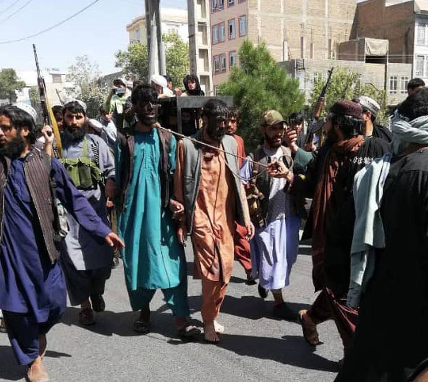 Men are paraded through the streets of Herat by the Taliban. Photo / Supplied