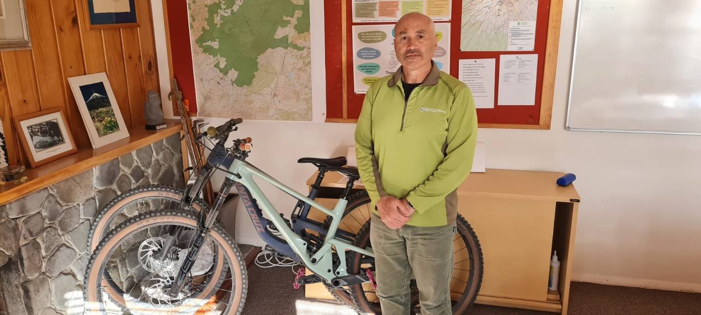 Operations manager George Taylor with the confiscated bikes. Photo / D Van der Lubbe, DoC