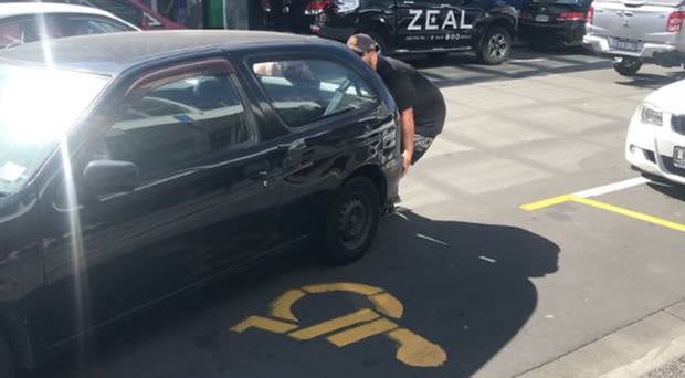 With the car blocking a whole lane, local Levi Pauling decided to deal with the matter himself. Photo / Michaela Smith