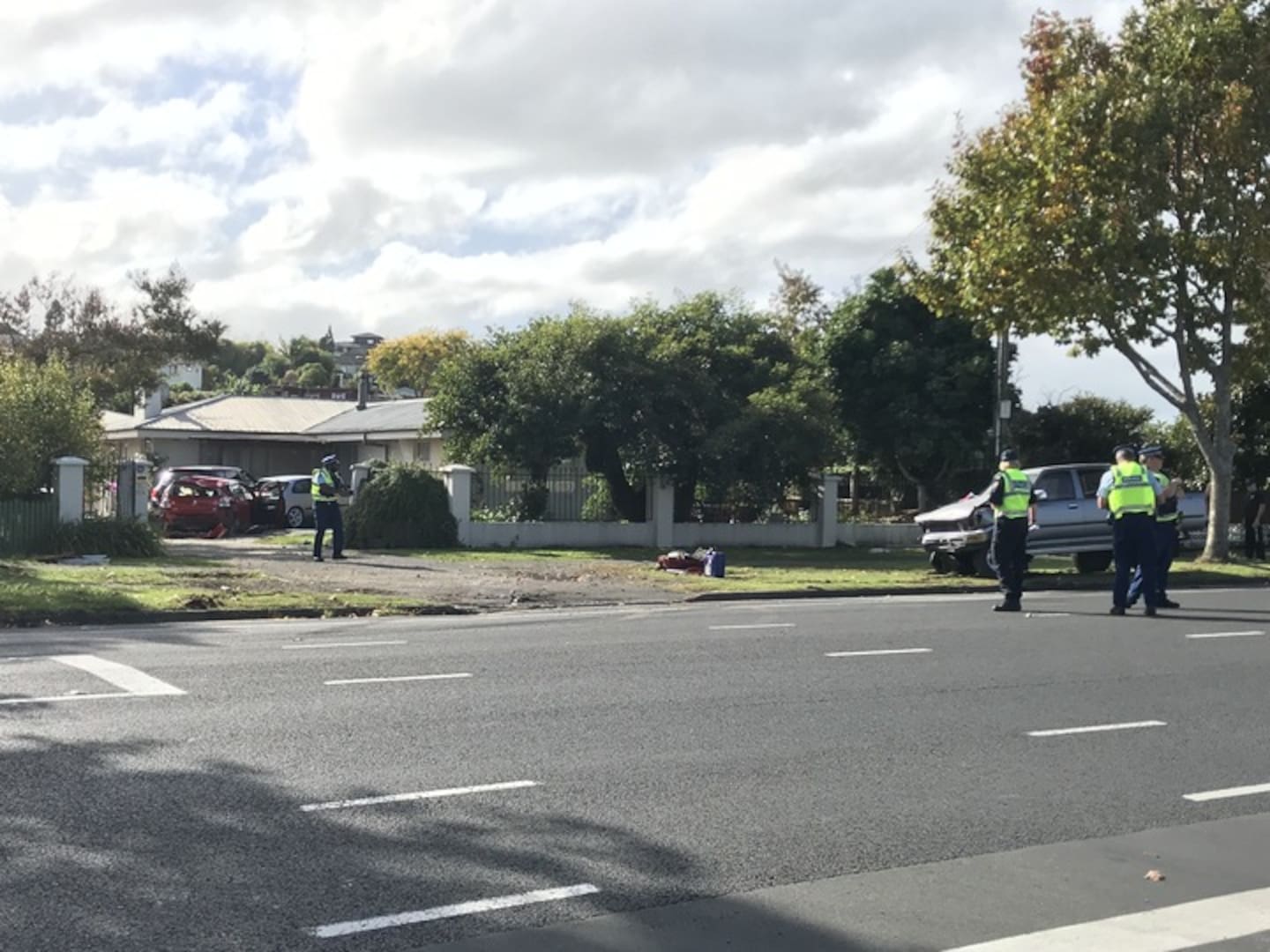 Police at the scene of the crash at the intersection of Whatawhata Rd and Poaka Ave, Hamilton, in April 2021. Photo / Belinda Feek