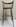 The wooden high chair with an angled back. (1984_105_1).