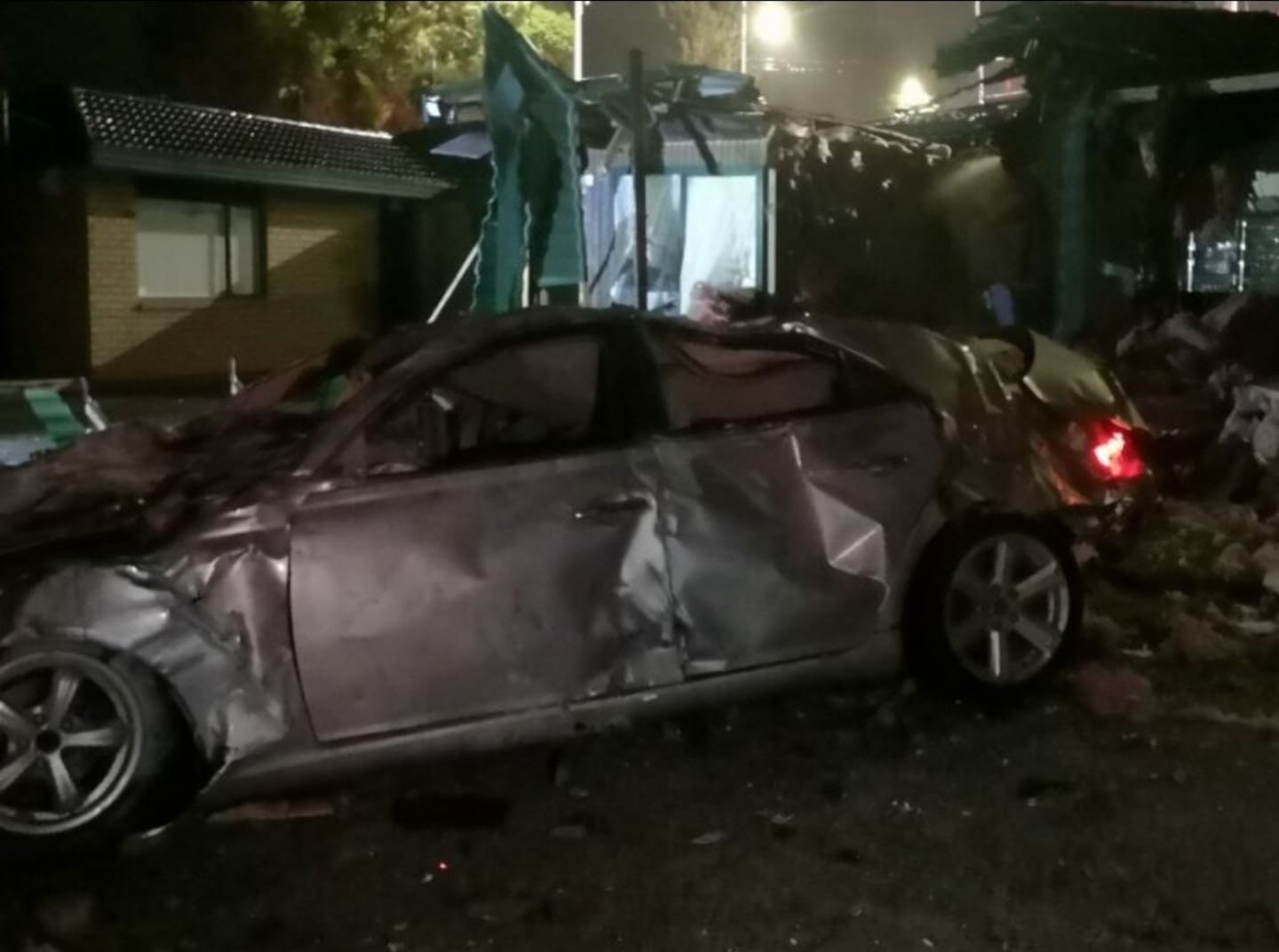 The stolen car that became airborne and hit Jim Beniston's Whangārei home in May. Photo / Supplied.