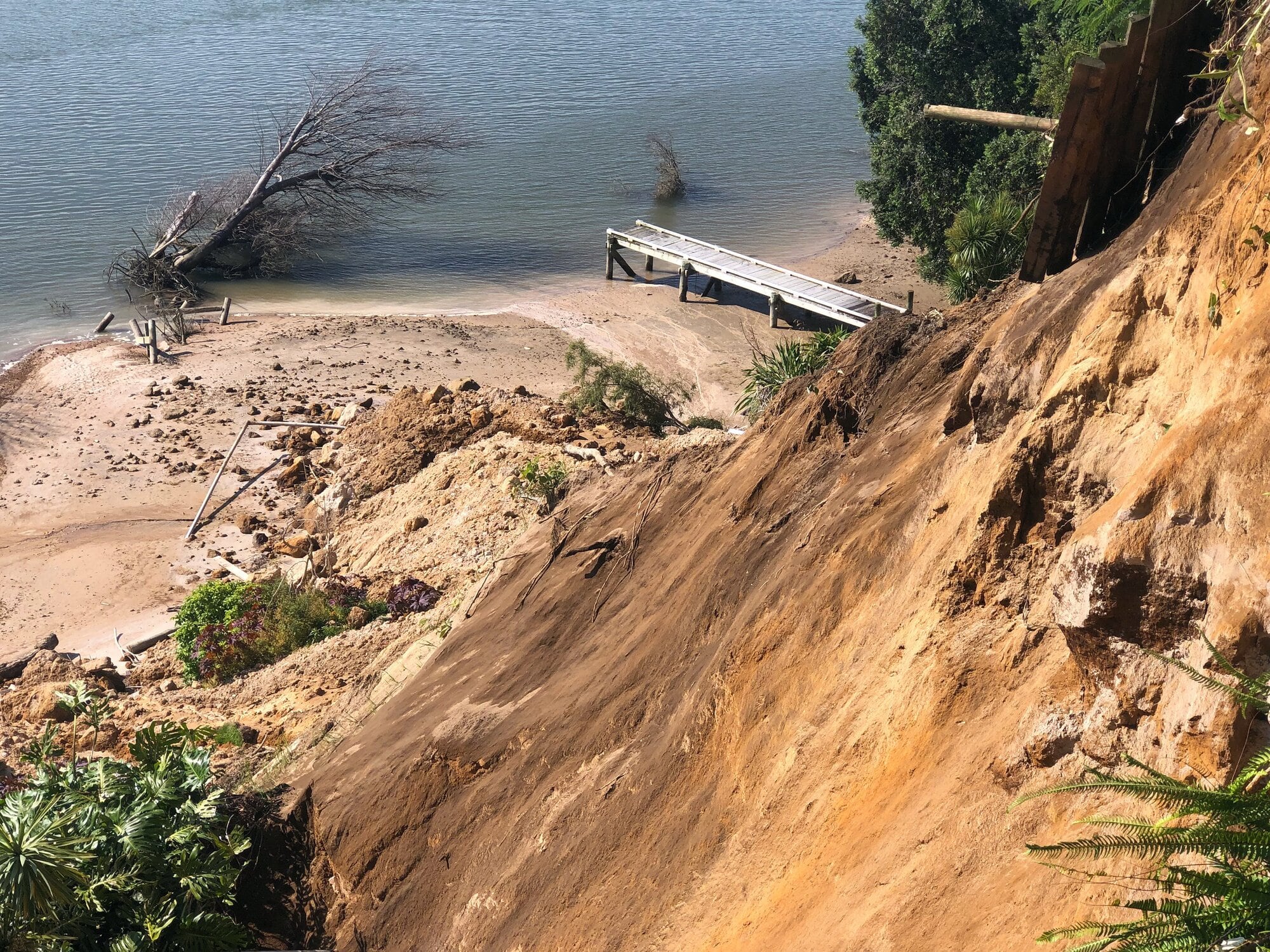 The 10m-wide slip took out most of Brian and Melanie Gardner's backyard. Photo / Supplied