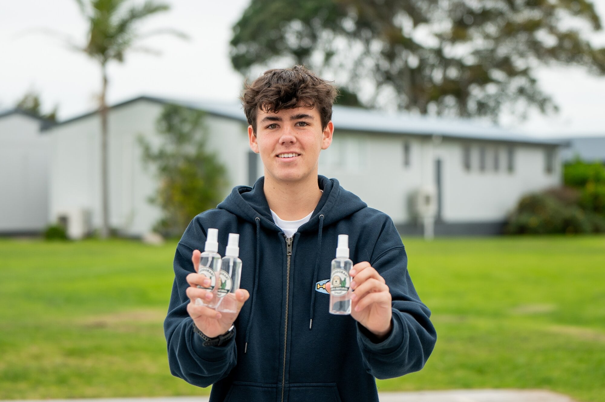  Mount Maunganui College year 13 student Corban Willson with his team’s ‘Dogodorant Spray’. Photo / Brydie Thompson