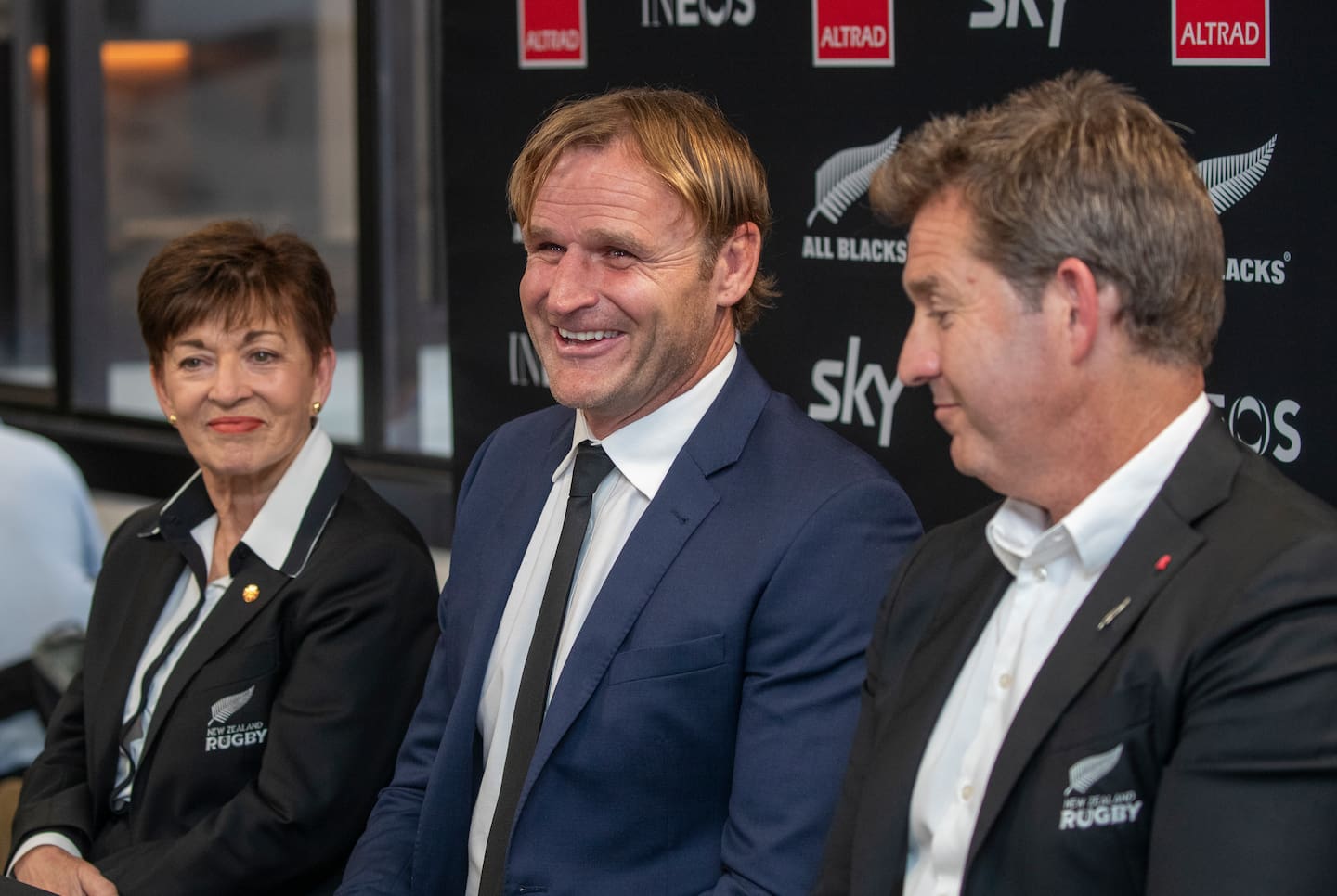 New Zealand Rugby chair Dame Patsy Reddy (from left), Scott Robertson and NZR CEO Mark Robinson speak to the media. Photo / Mark Mitchell
