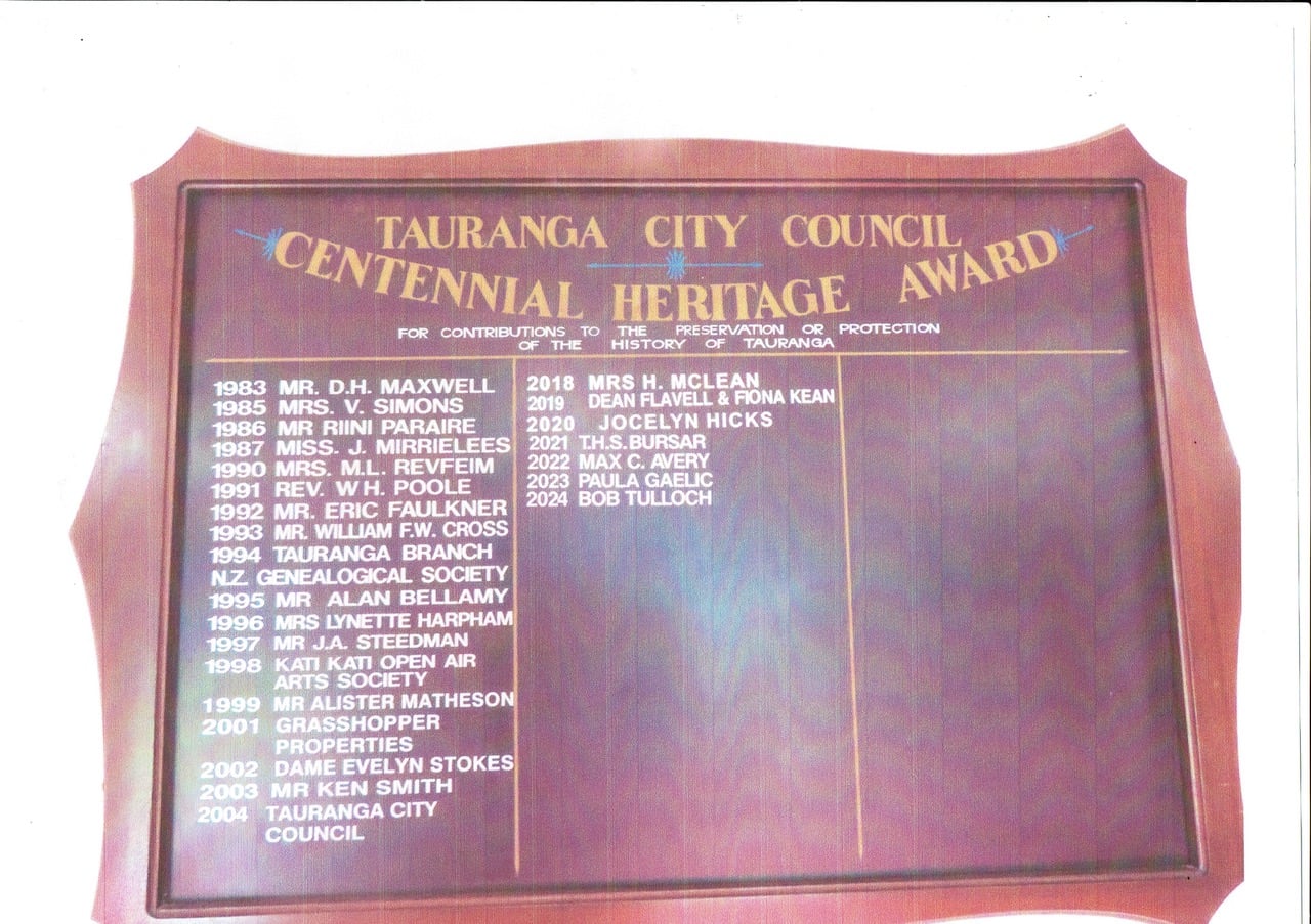 The Tauranga Centennial Heritage Award board is on display in Tauranga Historic Society's meeting hall behind Brain Watkin House.  Photo / Supplied