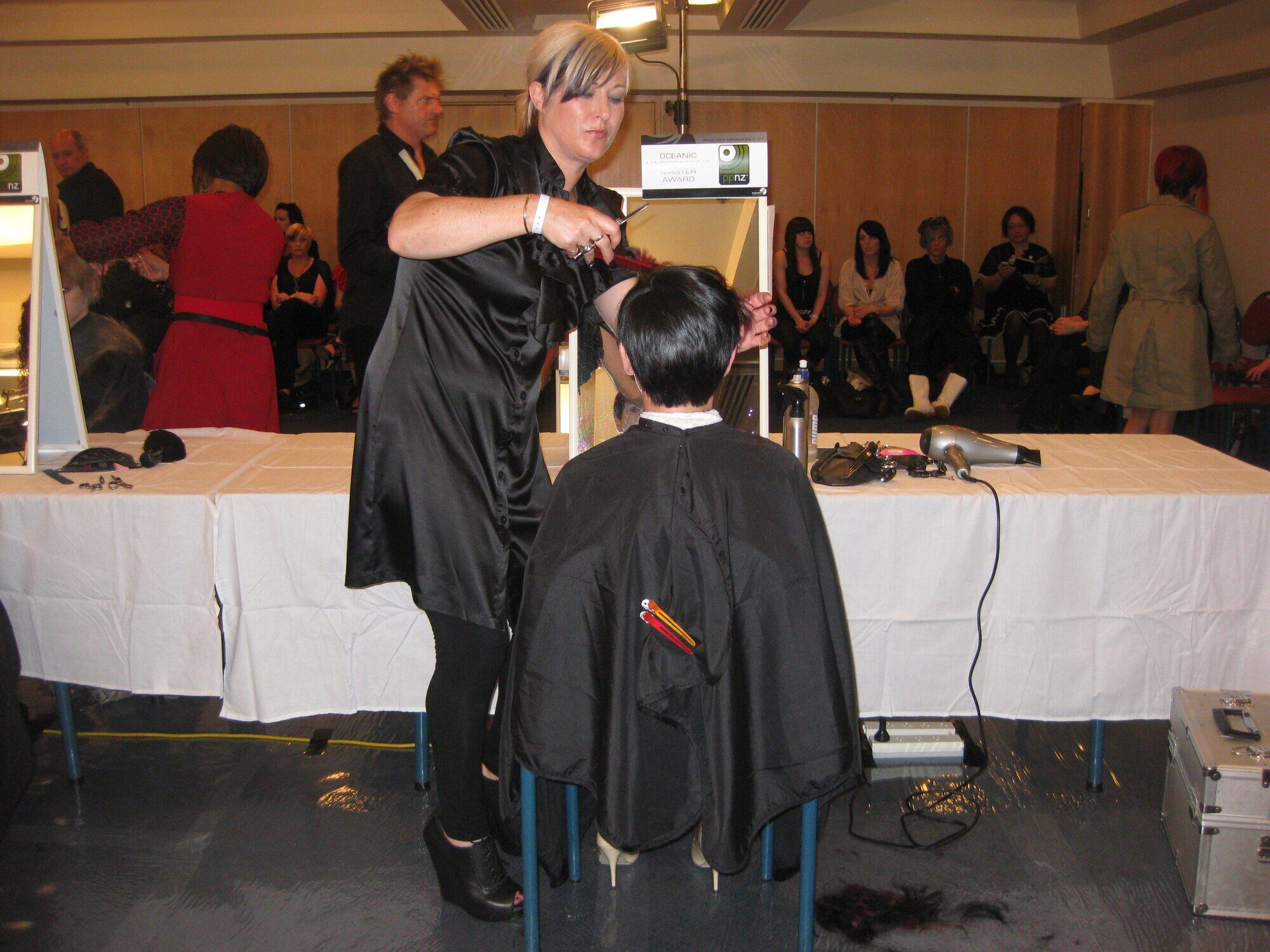 Liz Ward, Supreme National hairdressing champion in action at the Bay of Plenty Hair Design Fashion Awards in Tauranga.
KTA 03Aug11 - kk290711sp04 TOP SKILLS: Liz Ward, supreme national hairdressing champion in action at the Bay of Plenty Hair Design Fashion Awards in Tauranga.
Liz Ward, supreme national hairdressing champion in action at the Bay of Plenty Hair Design Fashion Awards in Tauranga in 2011. Photo / File