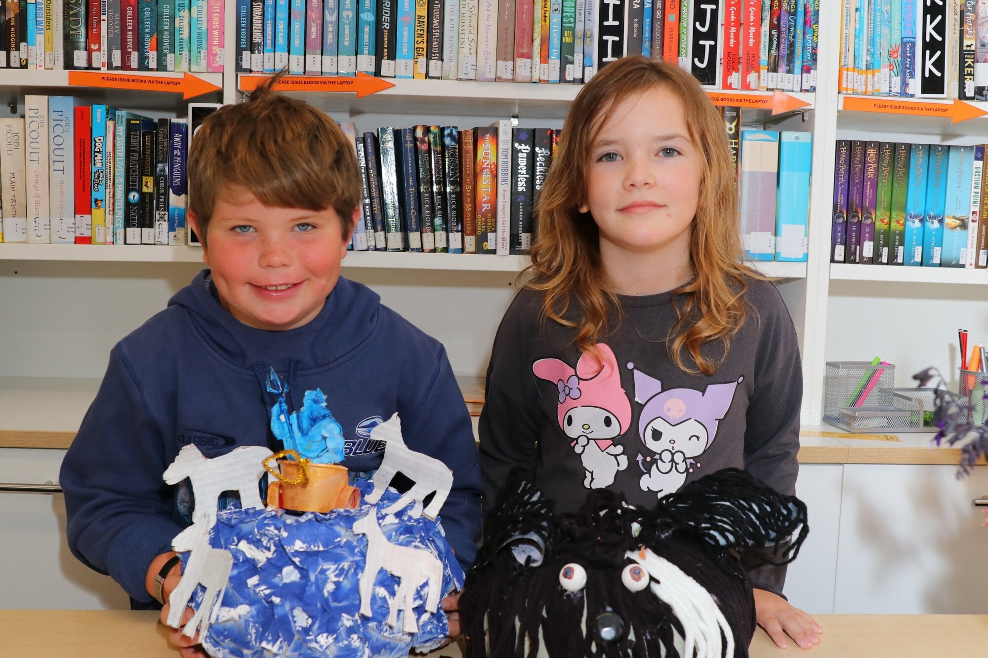  Northern Health School Tauranga Unit students Harry Ward, 7, and Piper Button, 10, with their pumpkin entries. Photo / Kelly O'Hara
