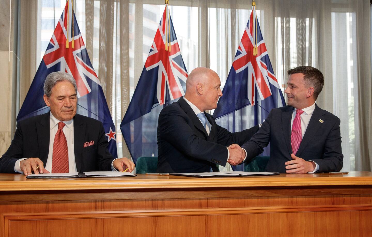 NZ First leader Winston Peters, National leader Christopher Luxon and Act leader David Seymour after signing their coalition agreement. Photo / Mark Mitchell