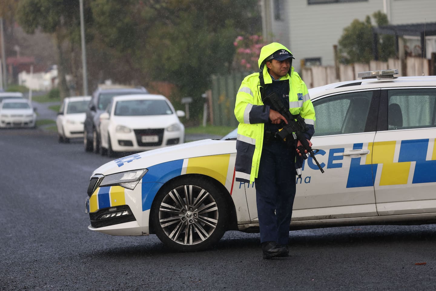 Armed police standing guard in Marvon Downs Ave in Pakuranga after residents heard gunfire. Photo / Jason Oxenham