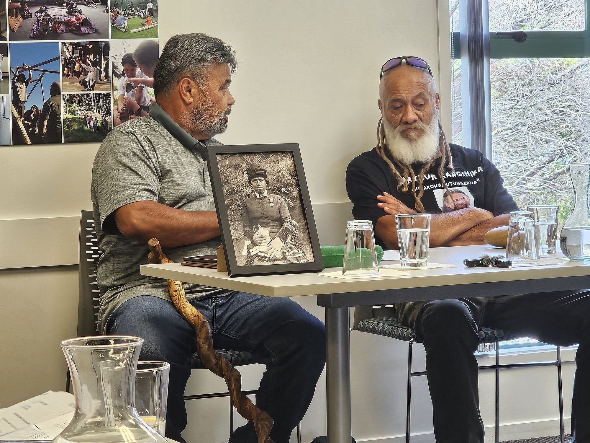  Ōpihi Whanaungakore trustees Hemi Hireme and Rapata Kopae with a photo of Guide Kate, famous for rescuing several people during the Tarawera eruption, who was buried at the urupa after having lived to 100. Photo / Diane McCarthy