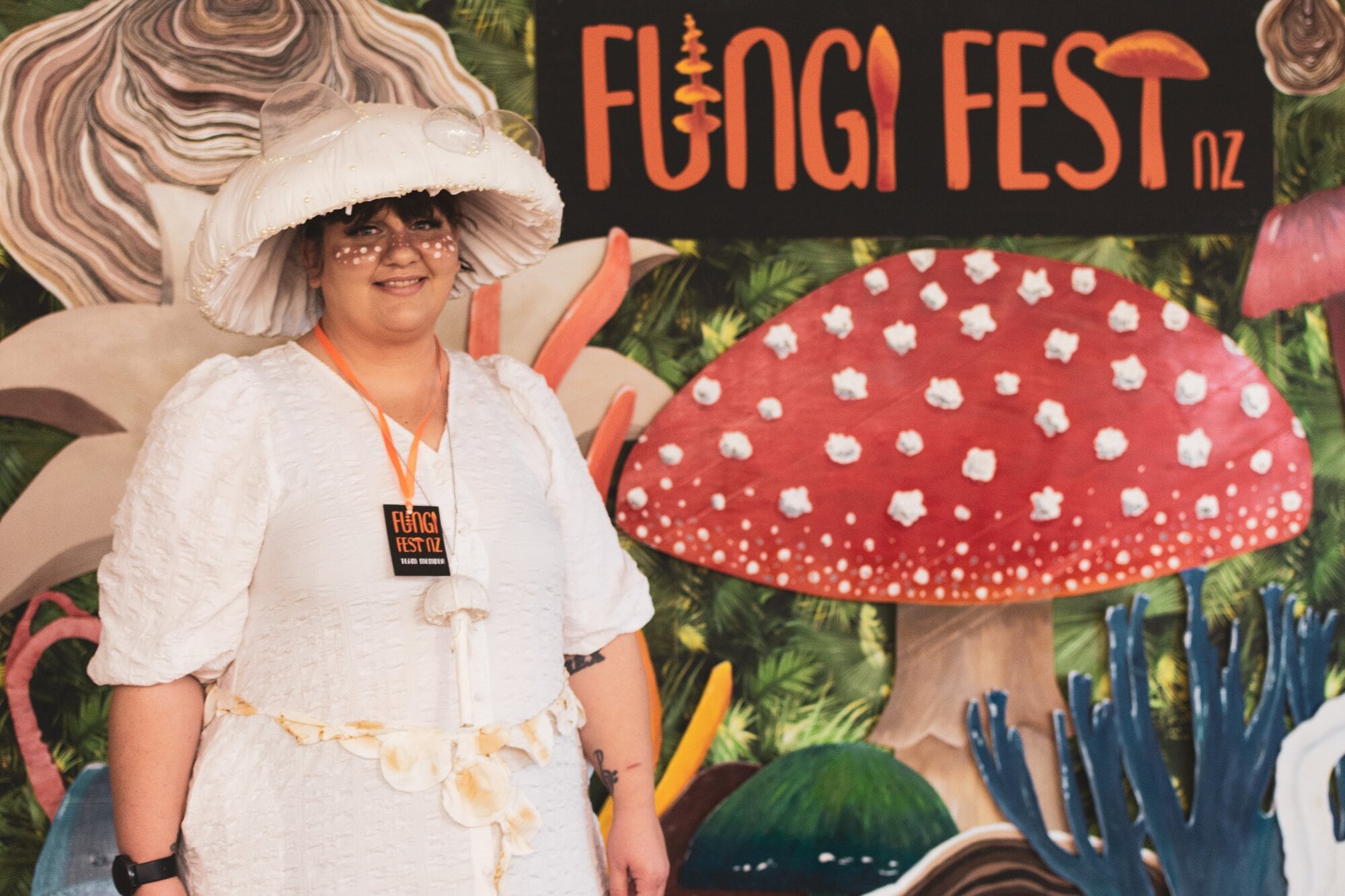  Darrinee Horton at a previous Fungi Fest in front of the photo wall. Photo/ Supplied