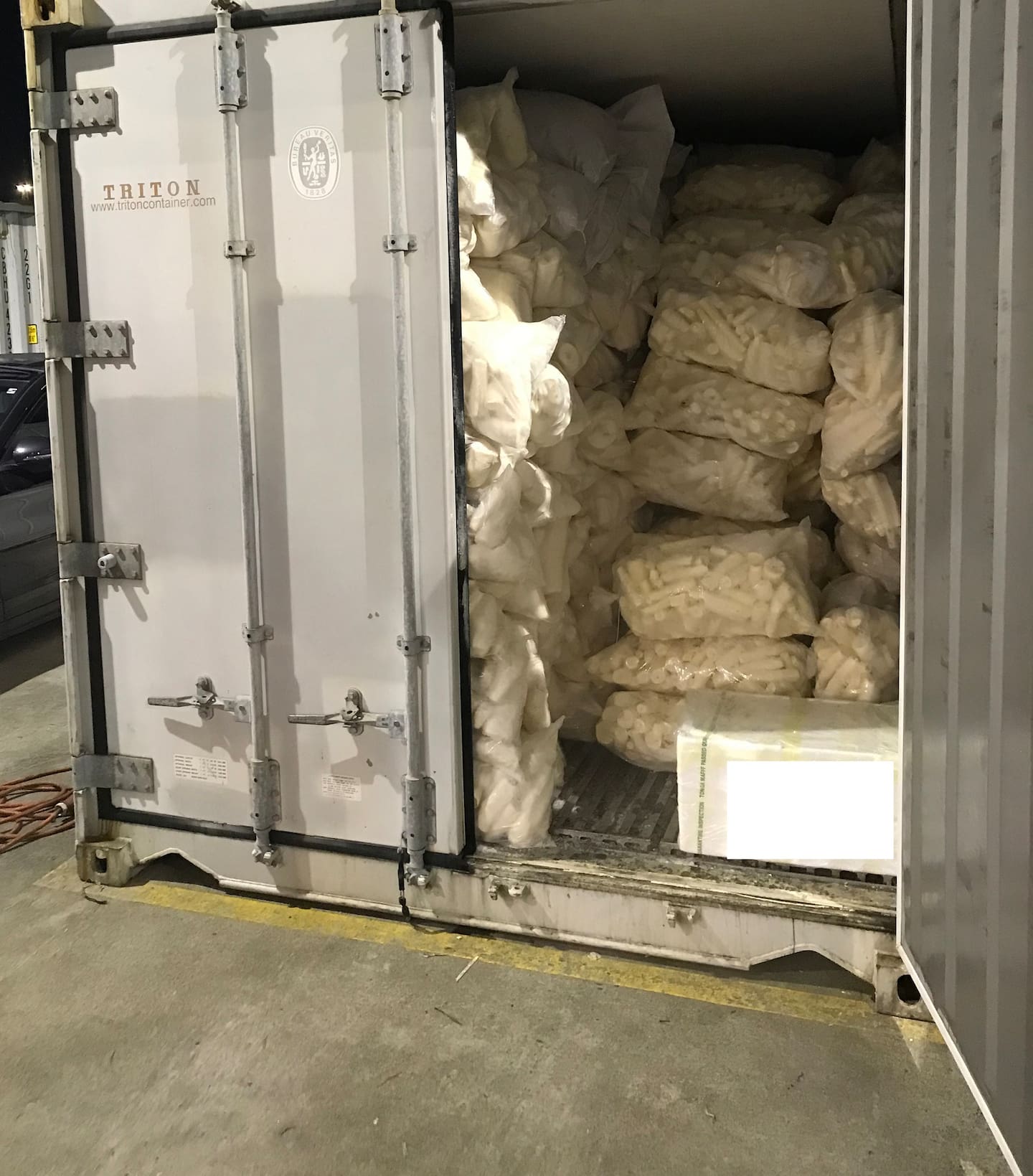 During Operation Schrute, authorities reported finding nearly 30kg of methamphetamine in a 20-foot shipping container from Tonga that arrived at Ports of Auckland in July 2021. The drugs were hidden among frozen produce, investigators said. Photo / NZ Police