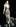 A model wears a creation by Versace. Photo / AP