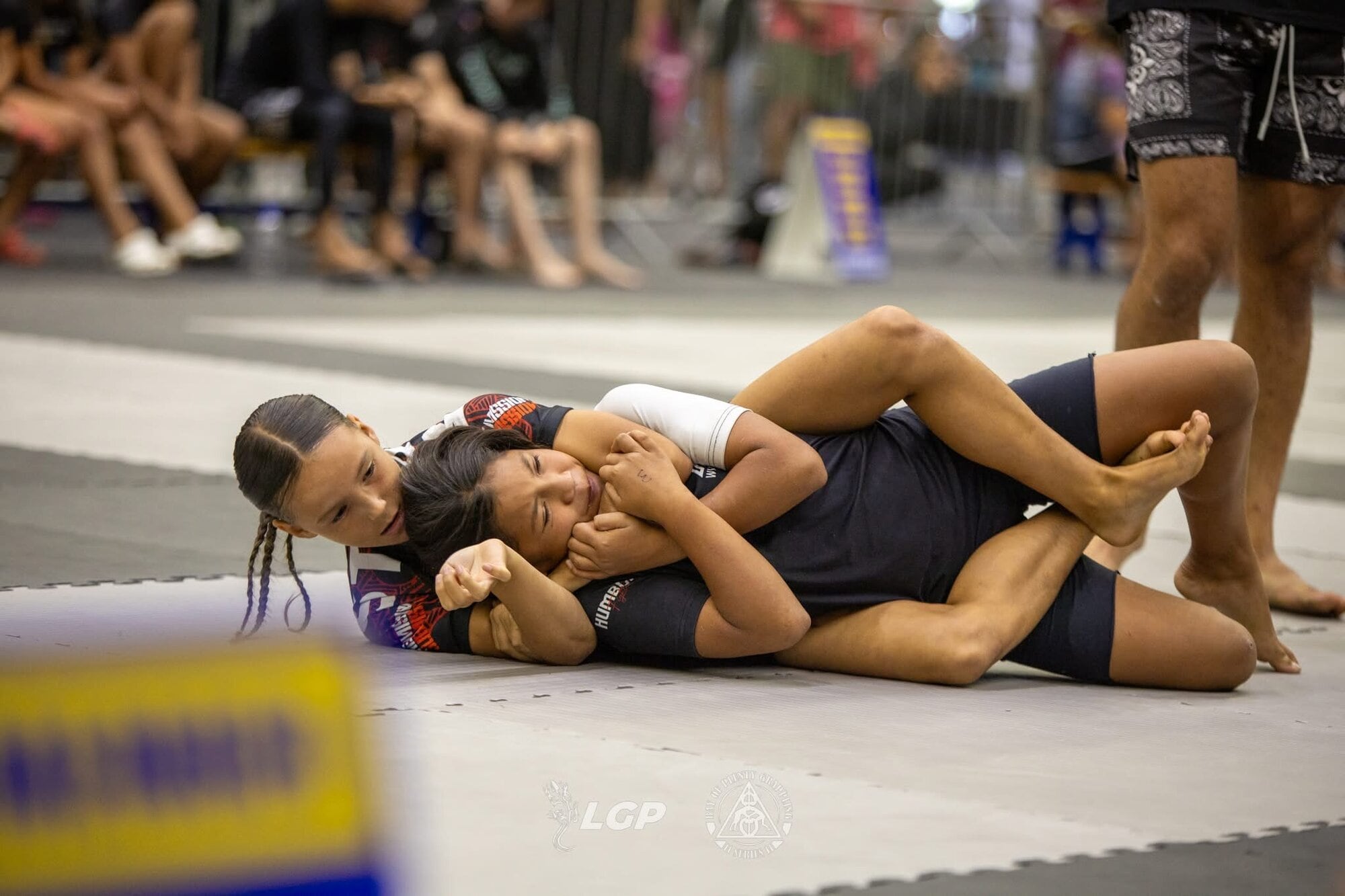 Stella Marukore,10, getting a choke submission.