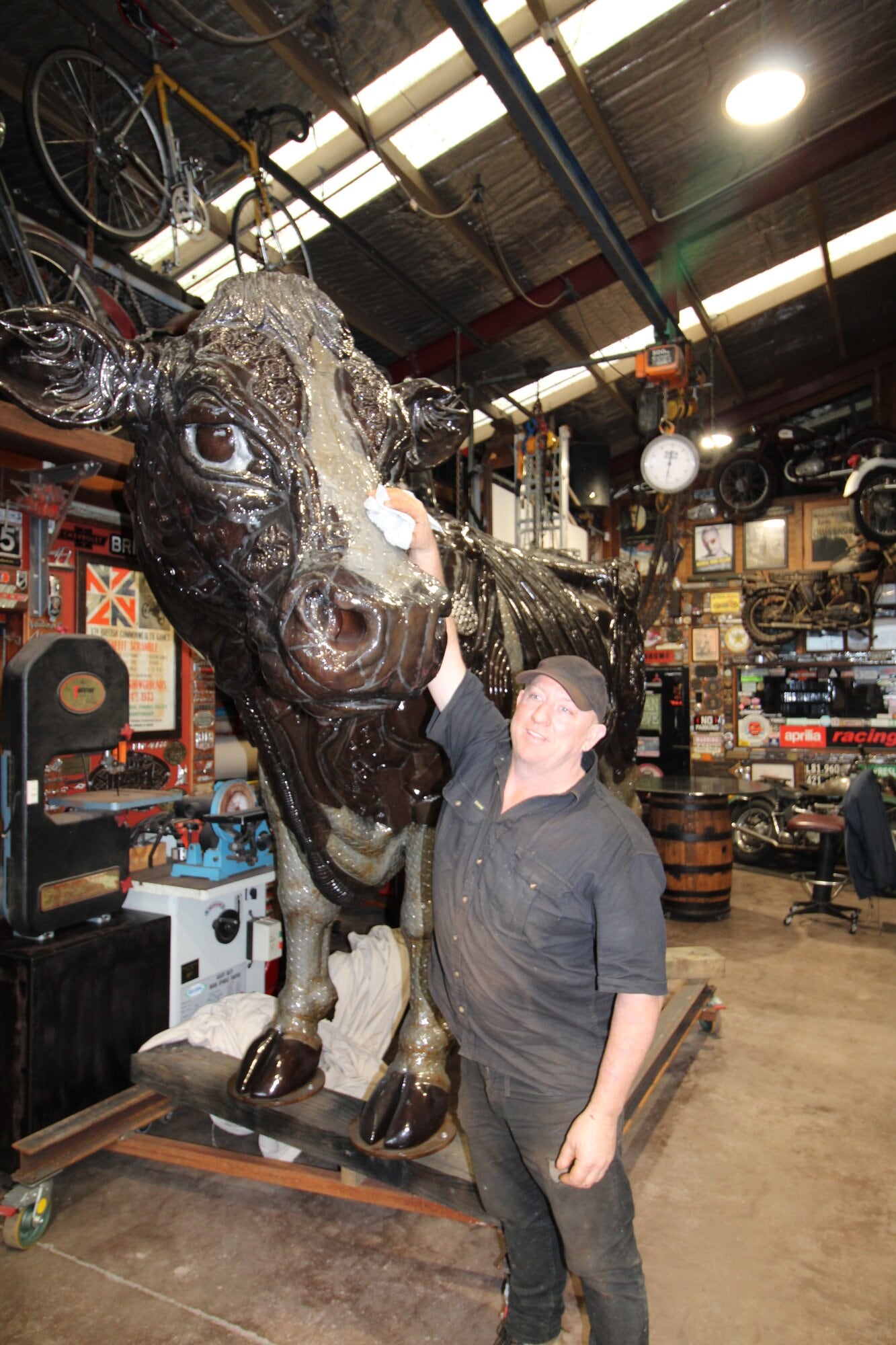 Adrian Worsley with his latest cow creation. Photos / Steve Edwards