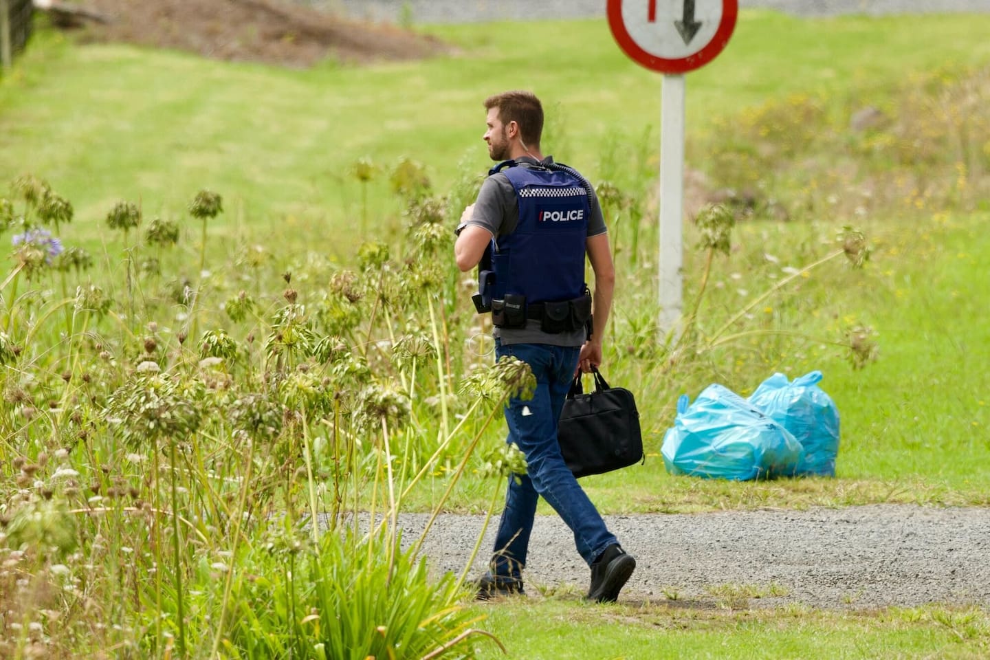 A number of police are in Kaihu as part of the investigation. Photo / Jason Dorday
