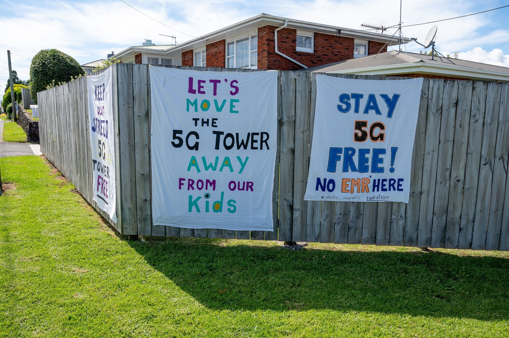 Residents want the tower relocated to a nearby industrial area, citing health and safety concerns.