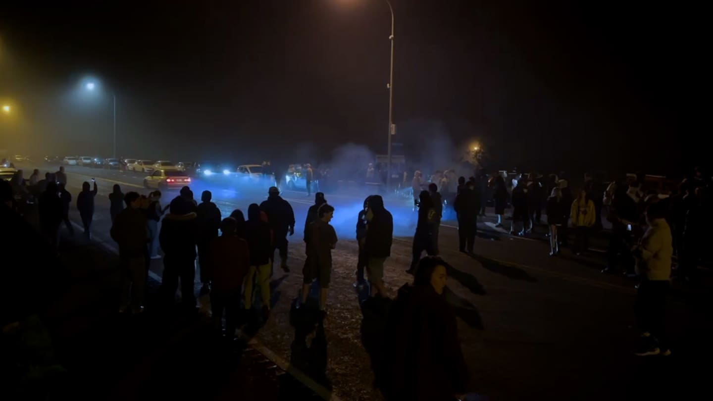 Car enthusiasts descended on State Highway 1 at the intersection of State Highway 2 and Rawiri Road in Mangatawhiri, where they carried out burnouts and drifting. Photo / NZ Herald