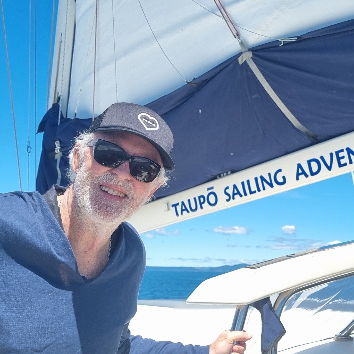  Actor John Lithgow enjoying sailing on Lake Taupō, on a day off from filming The Rule of Jenny Pen. Photo / Supplied