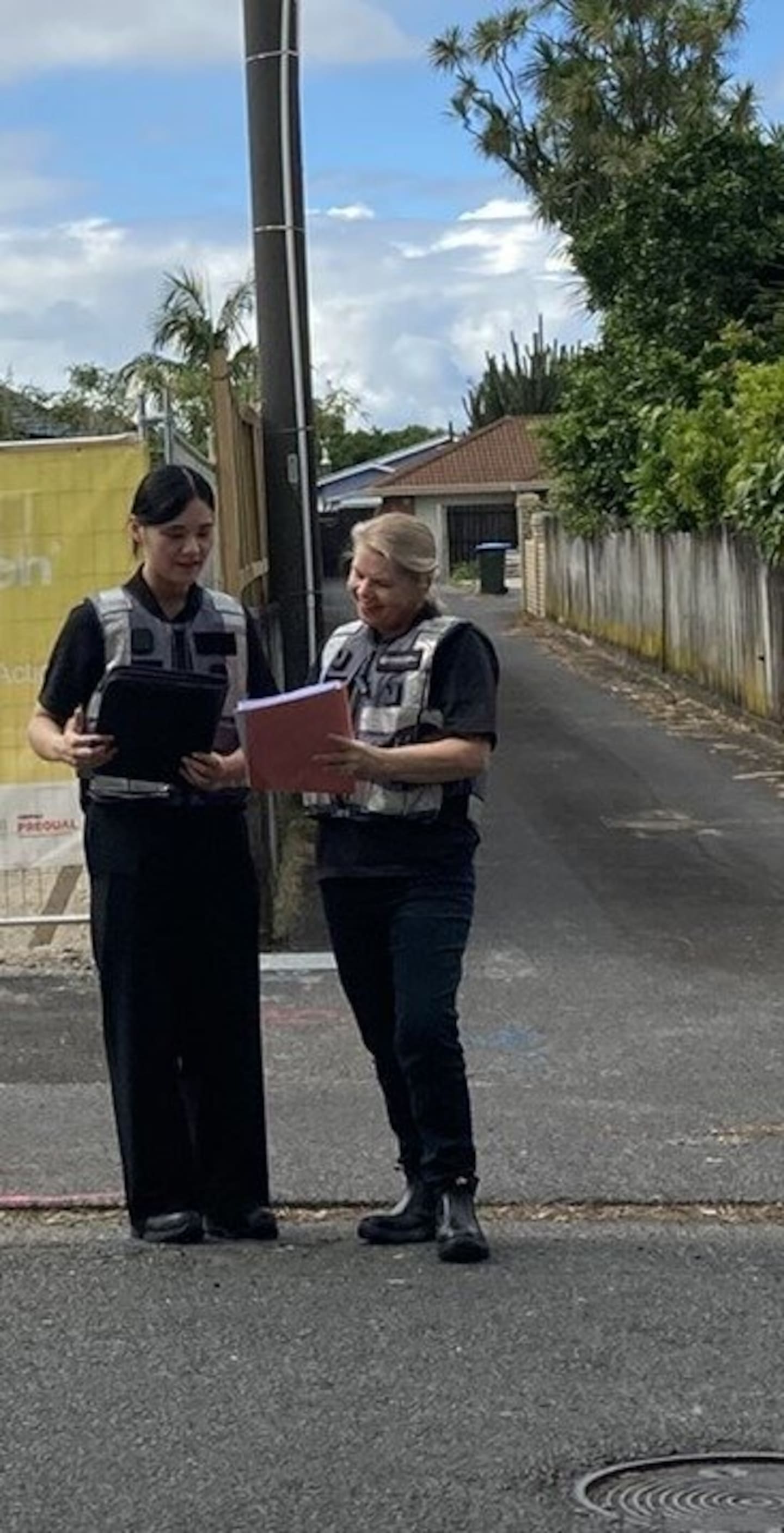 Labour inspectors pictured during Operation Rimu, a large, co-ordinated crackdown on North Island construction companies by regulators last week. Photo / MBIE