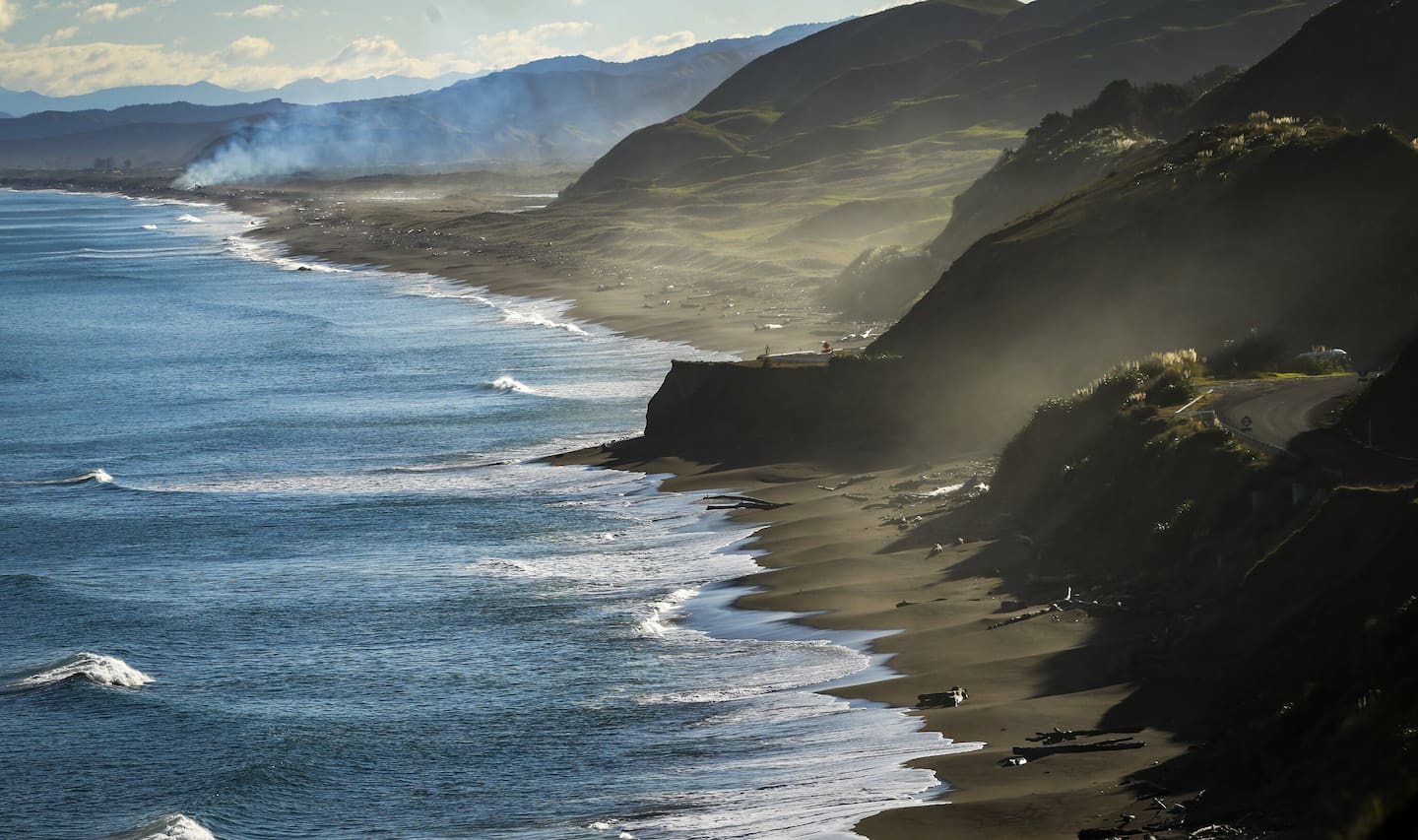 Two of the stricken men were spotted alive this afternoon in the water off Mahia but could not be rescued due to the terrible conditions. Photo / Paul Taylor