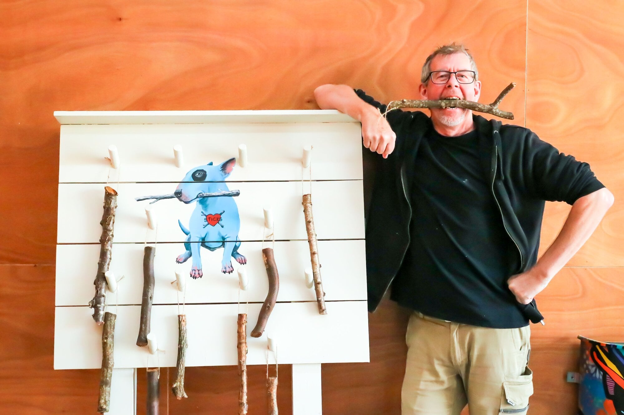 Nick Eggleston has created a dog stick library at Tauranga Historic Village. Photo / Kelly O’Hara