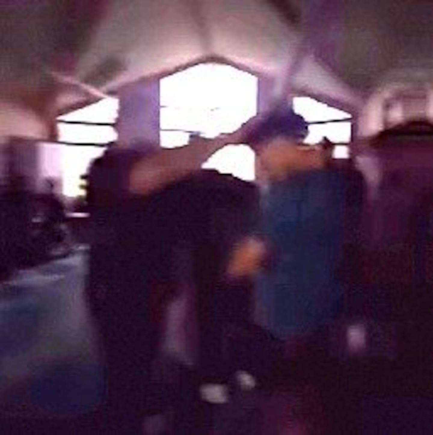 A staff member is allegedly seen "laying hands" on a Wesley College student during one of the ceremonies. The claims have sparked an independent investigation.