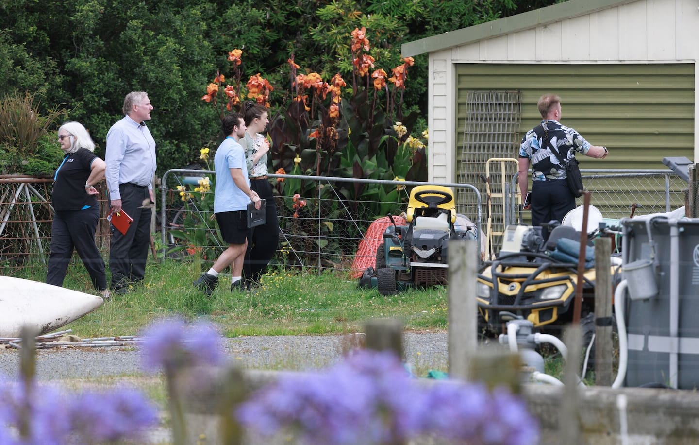 Police and forensic investigators at the property on Waitārere Beach Rd. Photo / Mark Mitchell