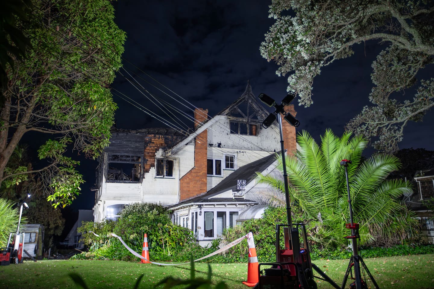 Sixteen fire appliances were required to battle the blaze at the backpackers' lodge at its peak. Photo / Hayden Woodward