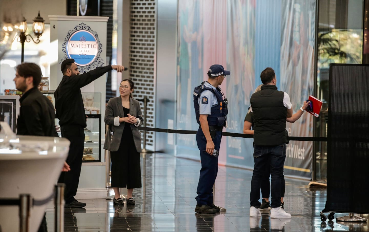 Police at the Northwest Shopping Centre Massey after armed robbers raided the Michael Hill Jeweller store. Photo / Alex Burton